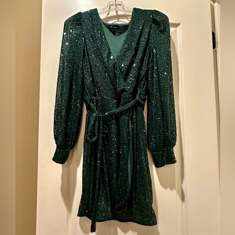 Sequined hunter green size Medium fits more like a junior size